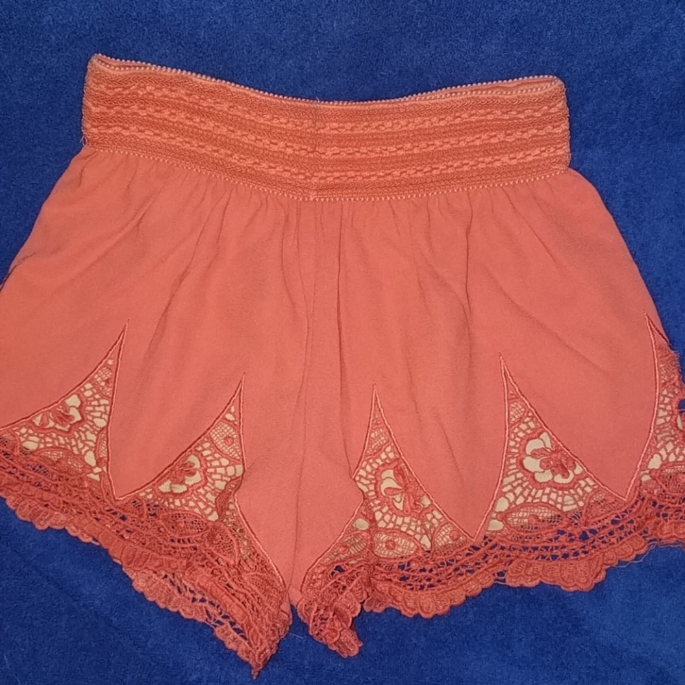 Orange crochet high waisted shorts